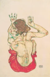 Nu féminin assis de dos avec jupe rouge